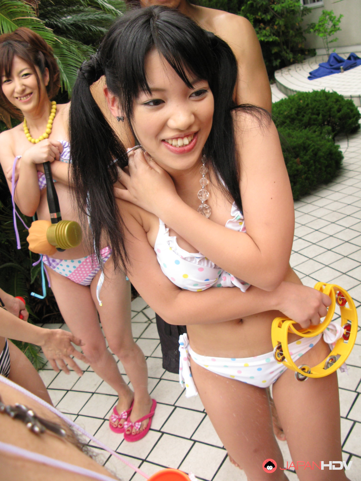 Japanese girls enjoy in some sexy pool party